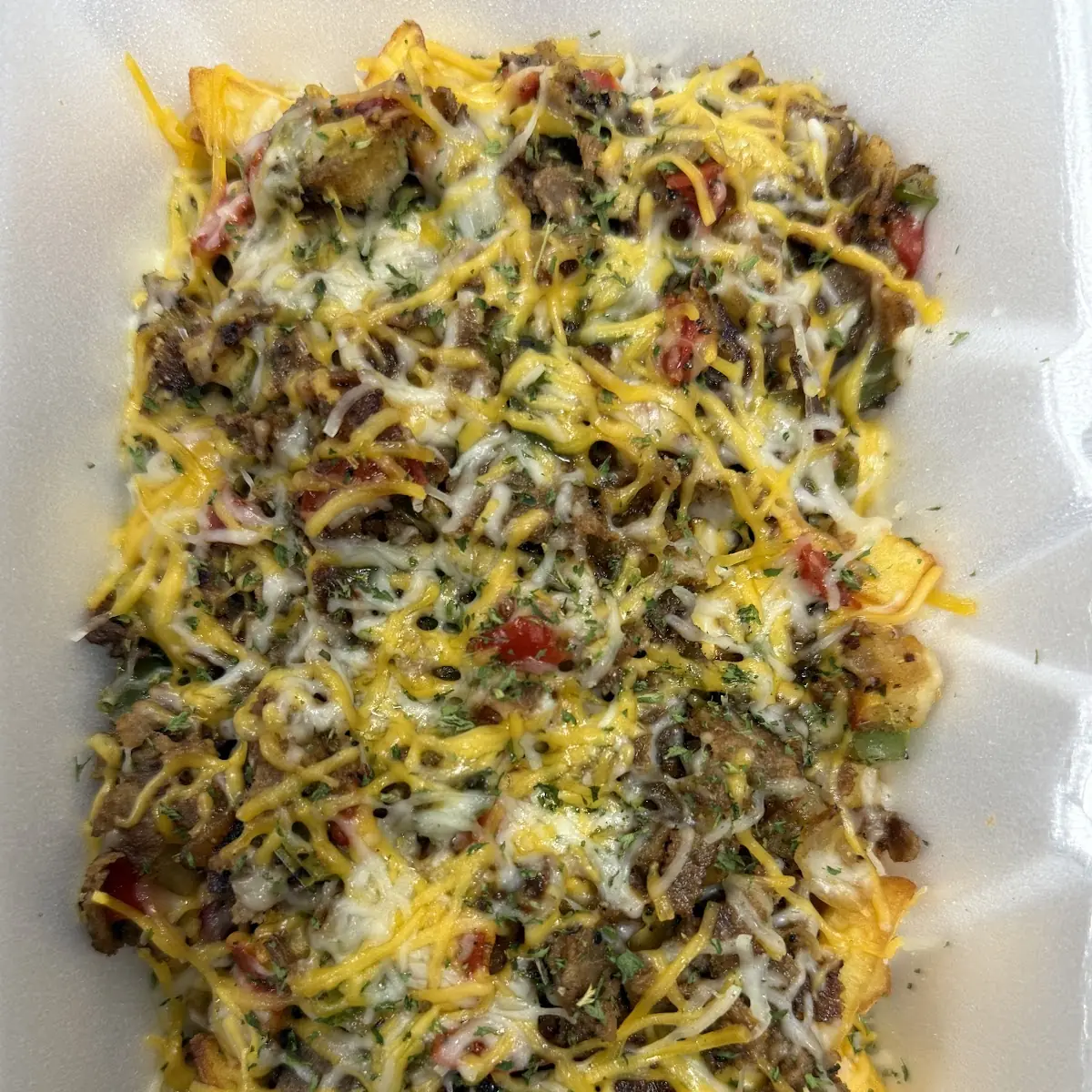 Loaded Nachos with Guacamole and Sour Cream