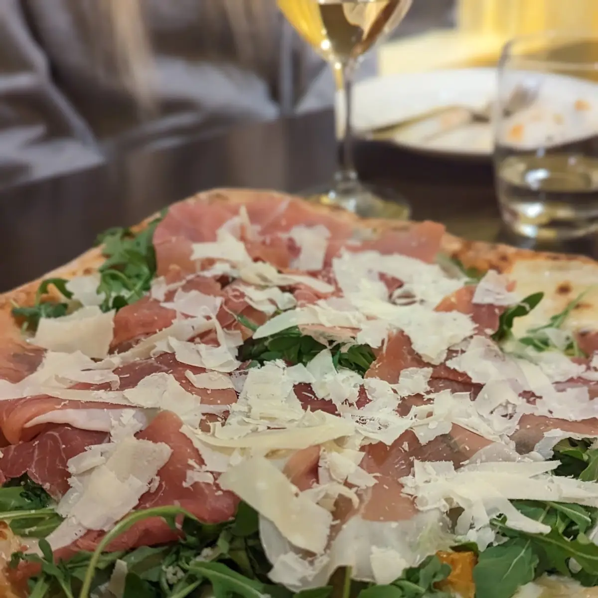 Proccuitto and Arugula Pizza