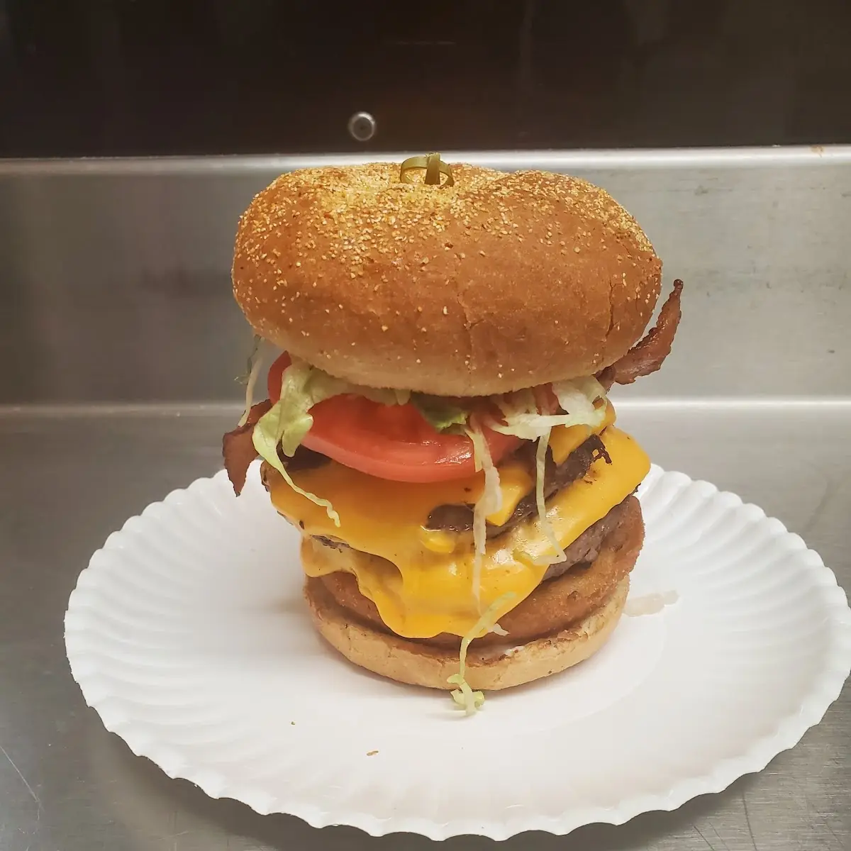 Double Bacon Cheeseburger with Onion Rings in It