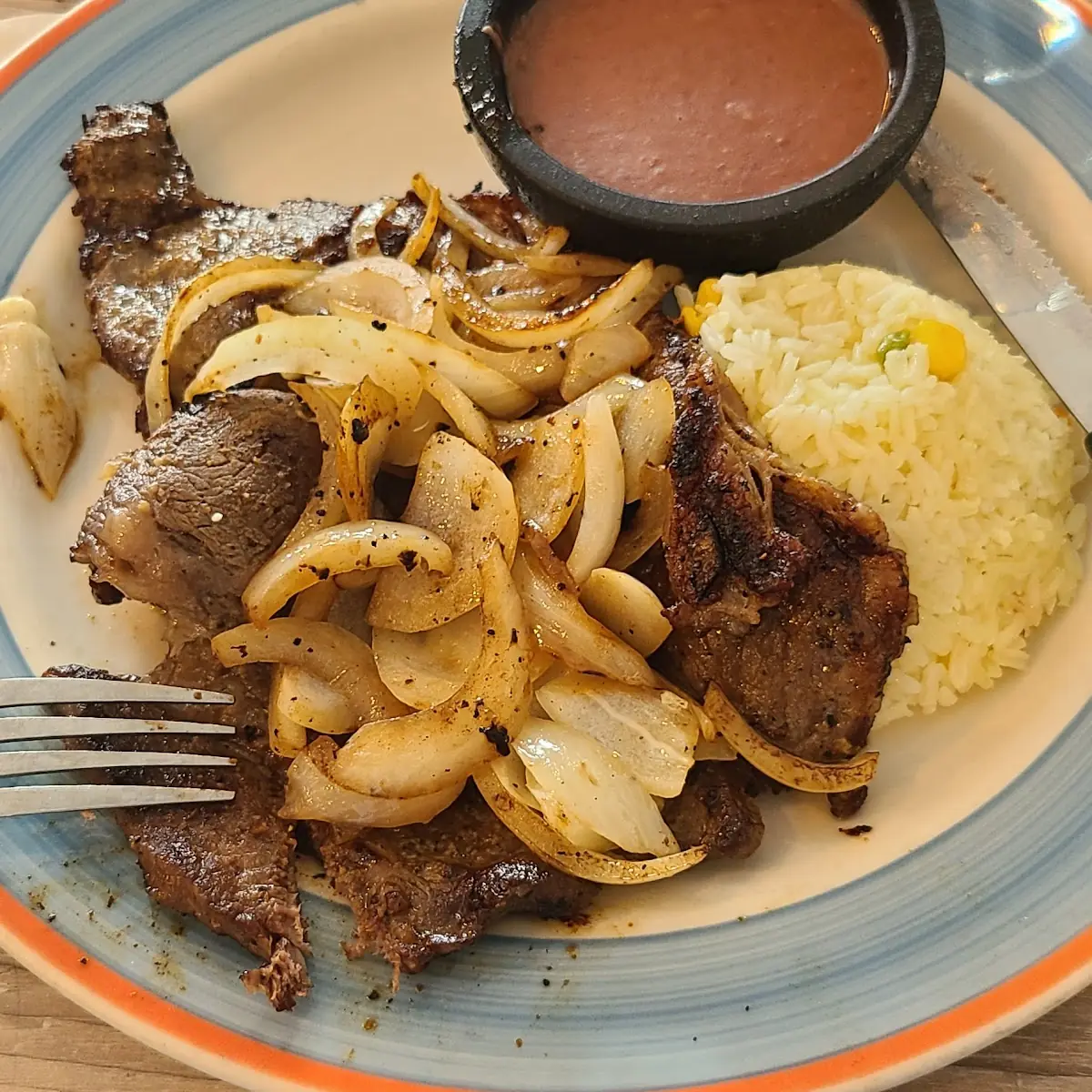 Bistec Encebollado