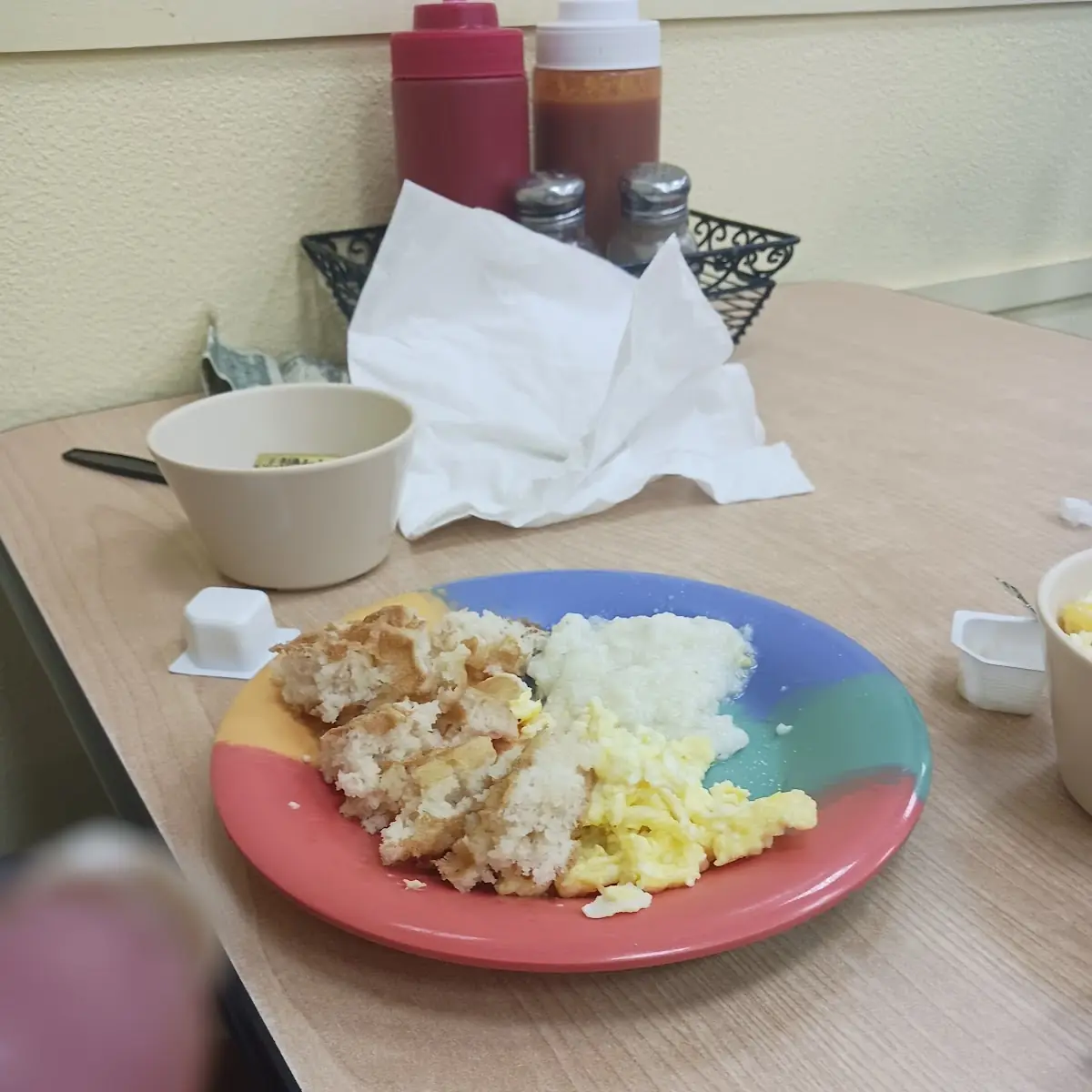 Grits with Half Cat Fish Half Chicken Wings with Waffle