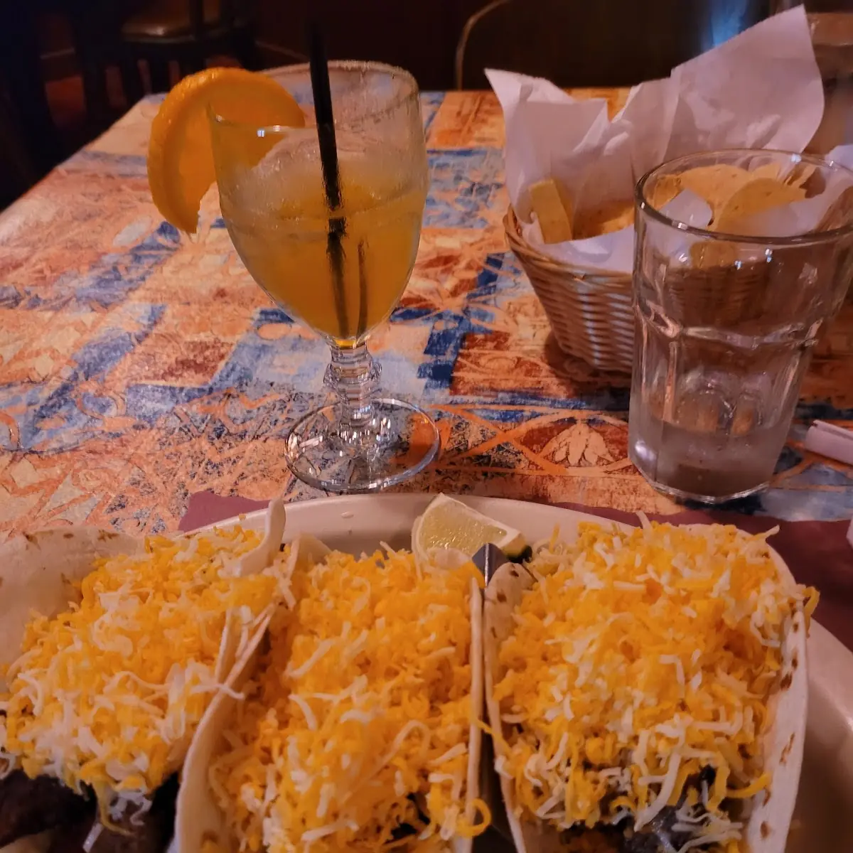Two Tacos with Rice Beans and Garnish