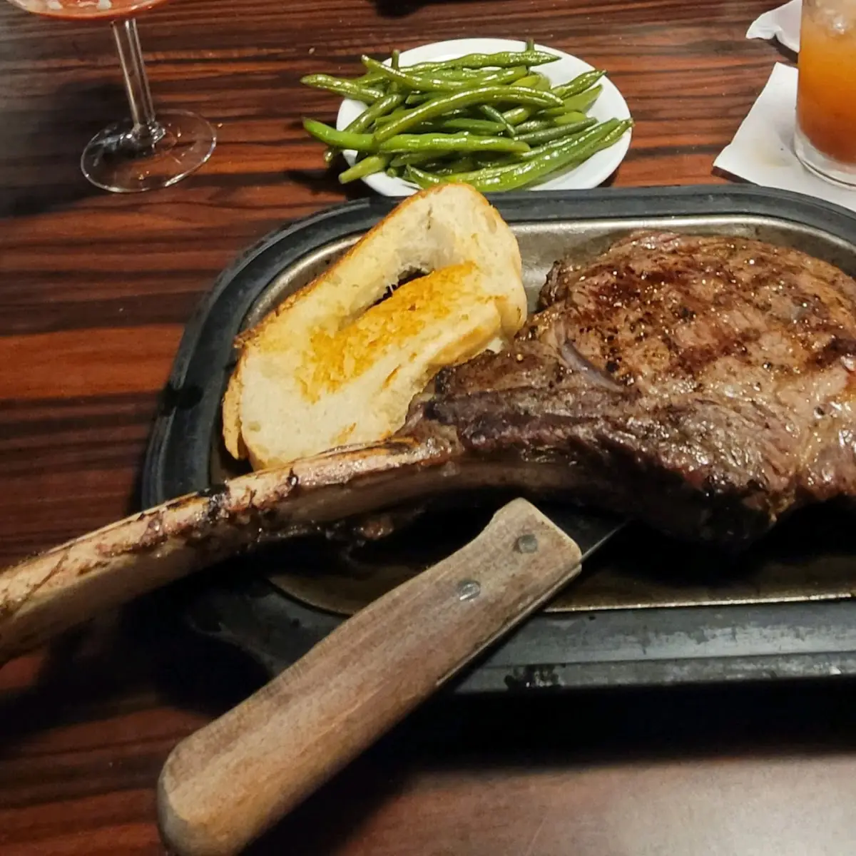 Tomahawk Ribeye Steak w Fresh Green Beans and Garlic Bread