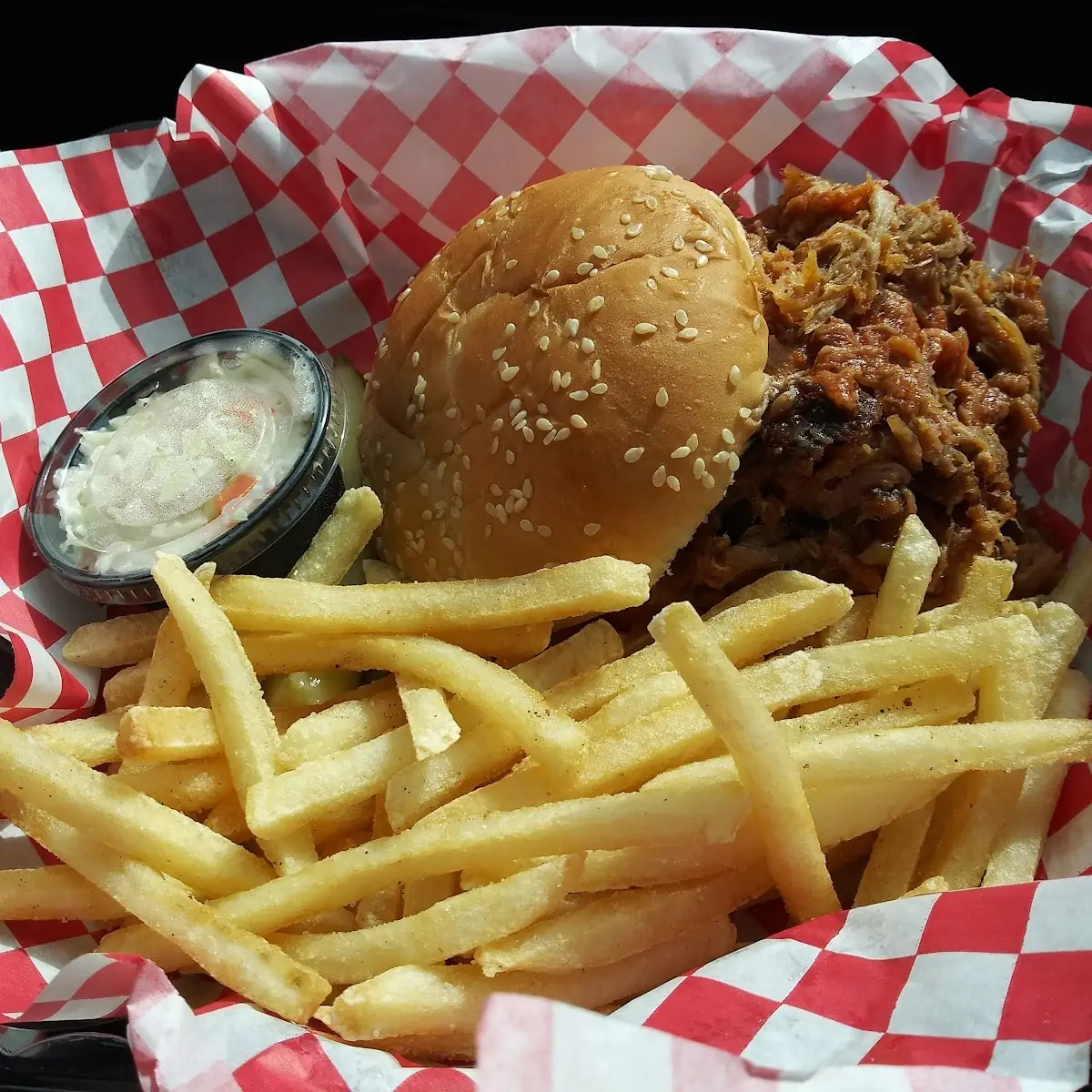 Pulled Pork Sandwich with Fries and a Pickle