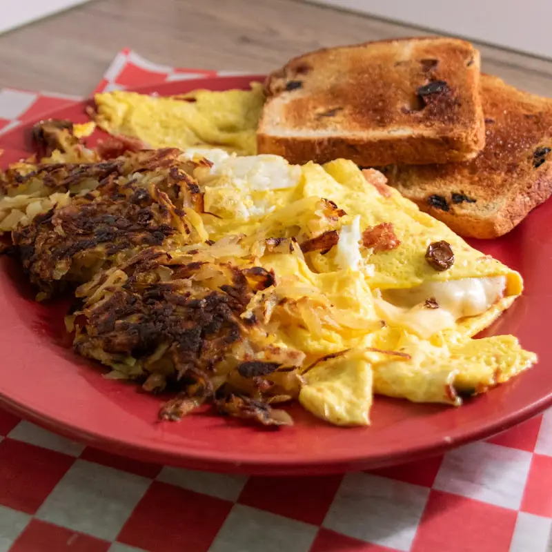 Two Eggs, Hash Browns And Toast