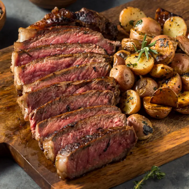 24oz Chuck Ribeye w/ 2 sides & Roll