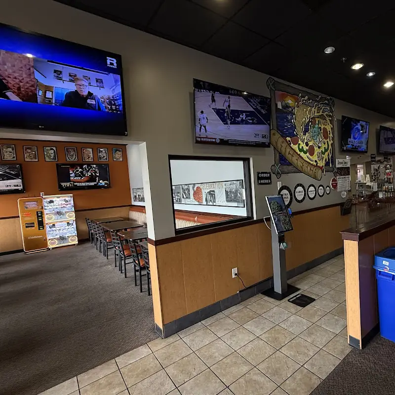 Up to 4-Topping Personal Pizza and 20 Oz Soda