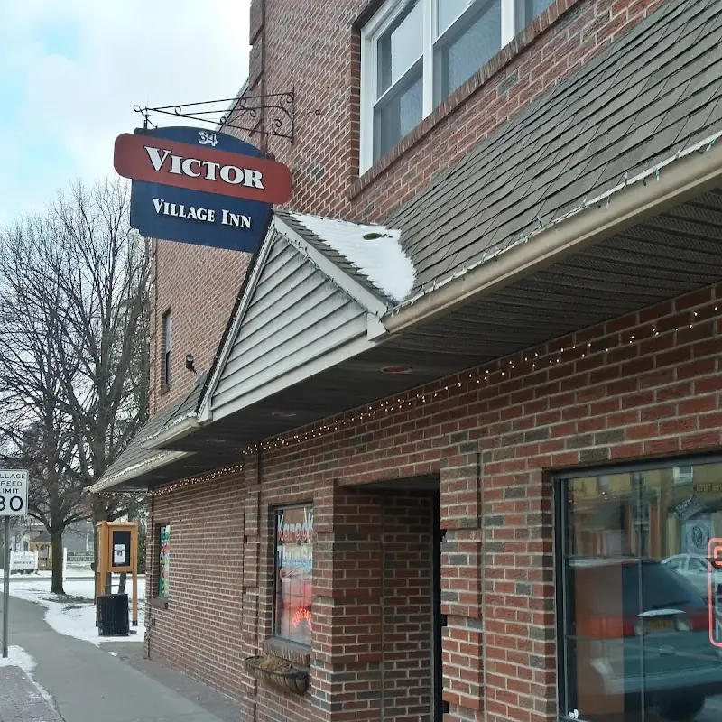 Victor Village Inn featuring TK's Pizza