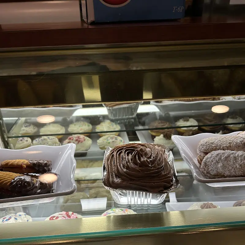 THE STONER REUBEN (Corn Beef, Turkey OR Ham with sauerkraut or coleslaw Swiss Cheese and  Thousand  Island dressing on Rye with Stoner Fries and a Pickle)
