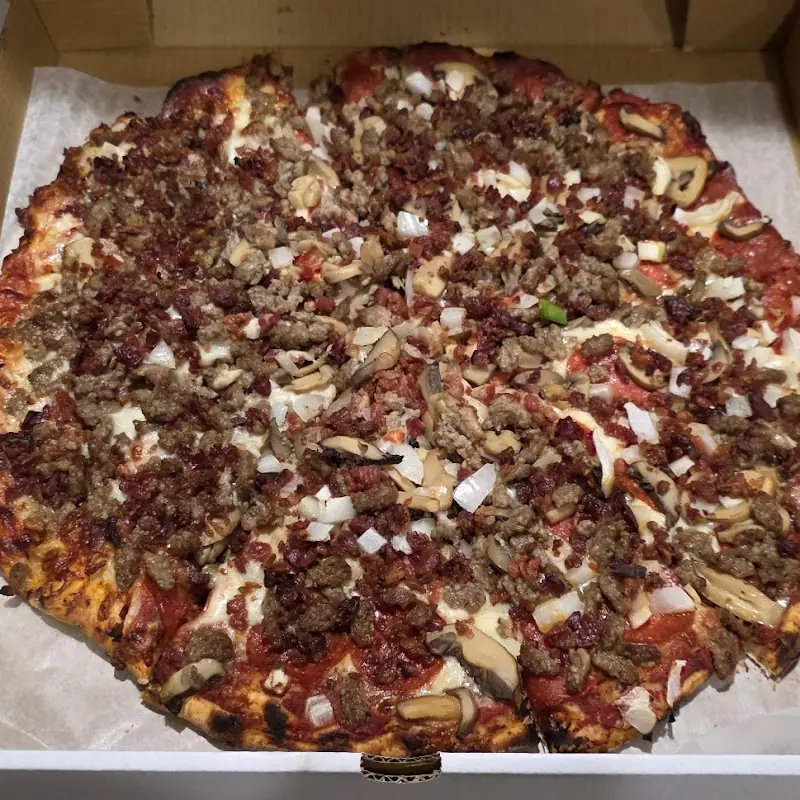 Tommy Tomatoes Masterpiece Pizza