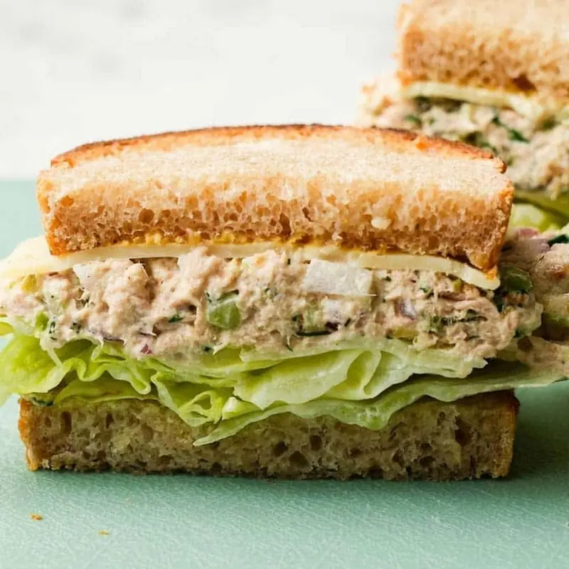 Grilled Chicken Sandwich (Grilled chicken breast with bacon, cheese, lettuce, tomato and a creamy sauce on a sesame seed bun)