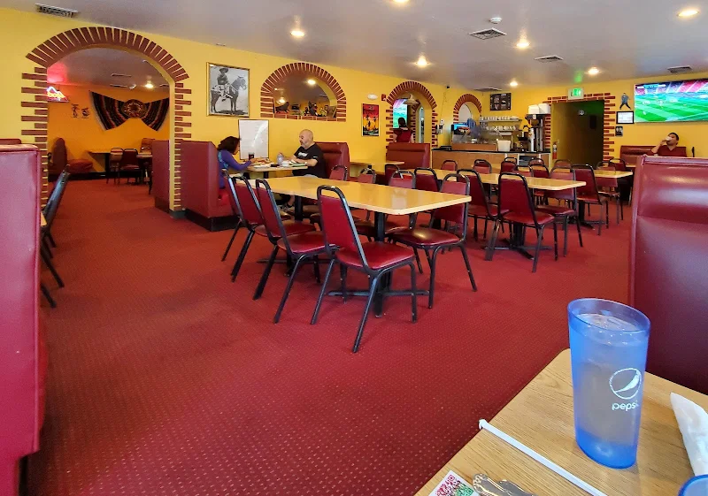 Combo F. Beef Enchilada, Beef Taco, Smothered Beef Burrito and Rice