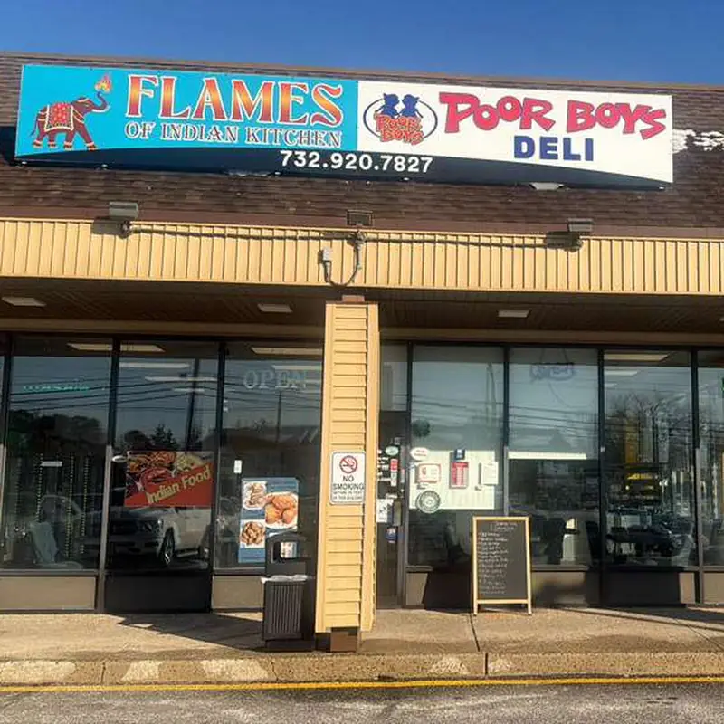 Flames of Indian Kitchen and Poor Boys Deli formerly Ellie’s