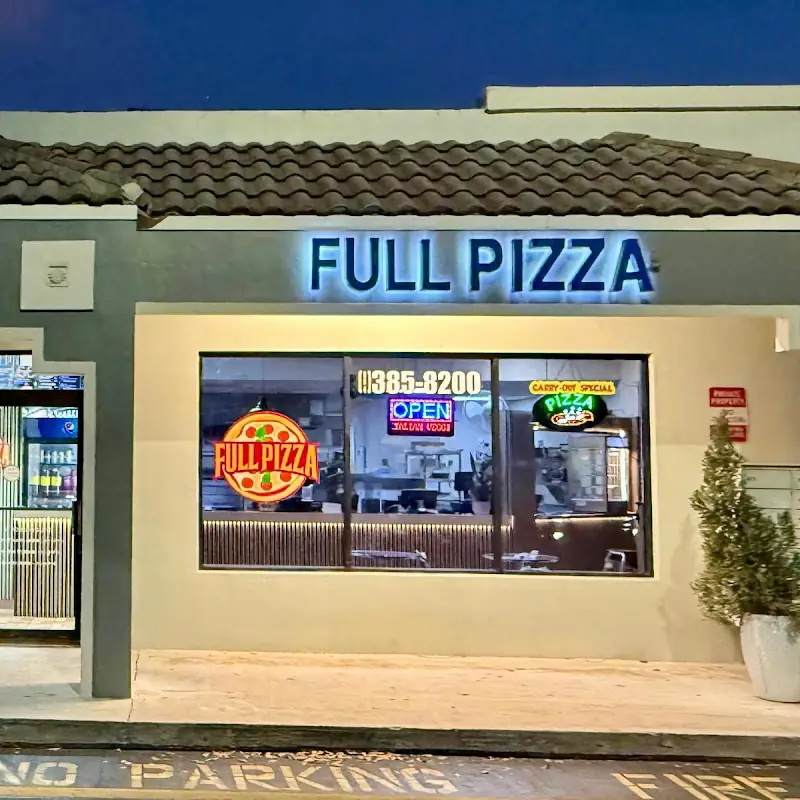 1 Large 14" specialty pizza + 1 baked sweet plantain +  1 / 2L Soda
