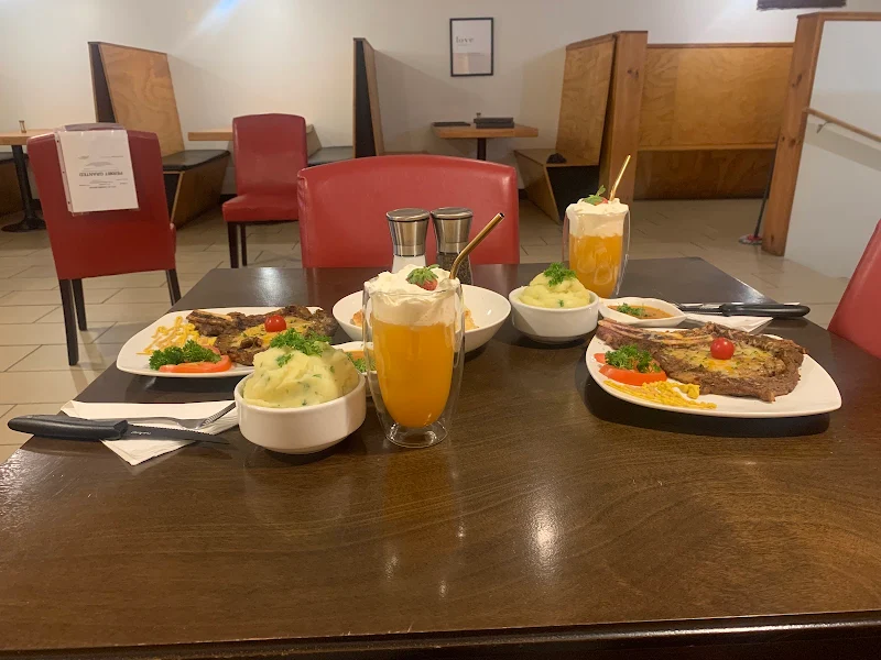 REAWL AQUA SAVEY RESTAURANT & CUPID PLUS Lounge Jamaican Fusion Restaurant