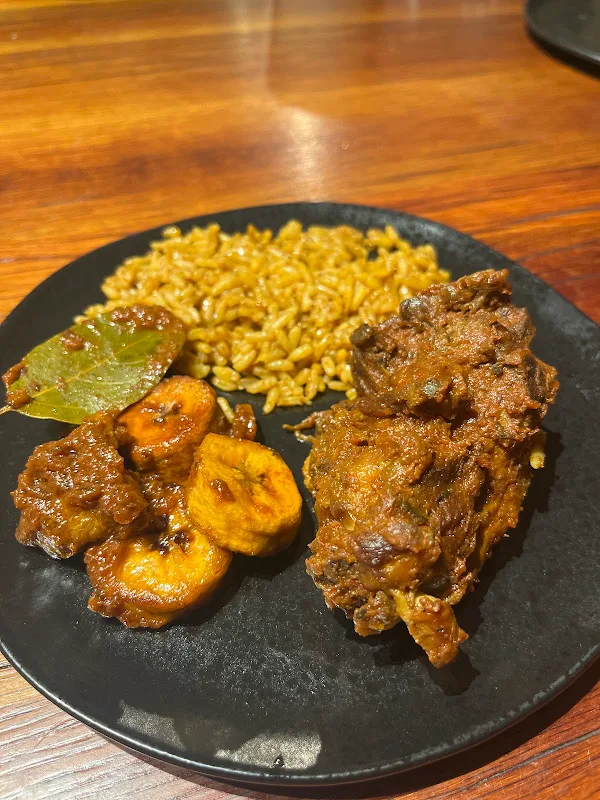 Steamed White Rice Served with Tomato Stew