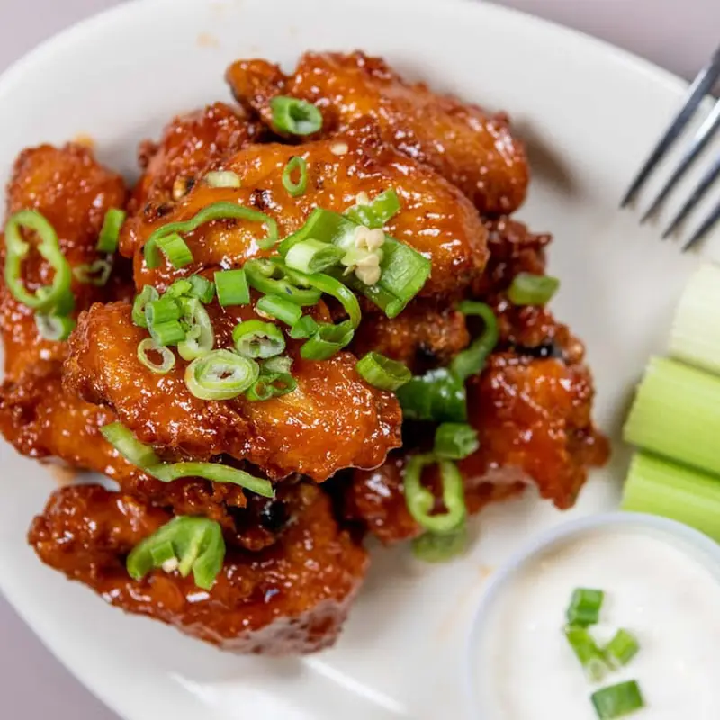 16. Egg Roll, Chicken Wings, & Boneless Spareribs