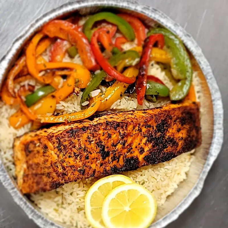 Full Pan of Salmon and Black Beans over White Rice
