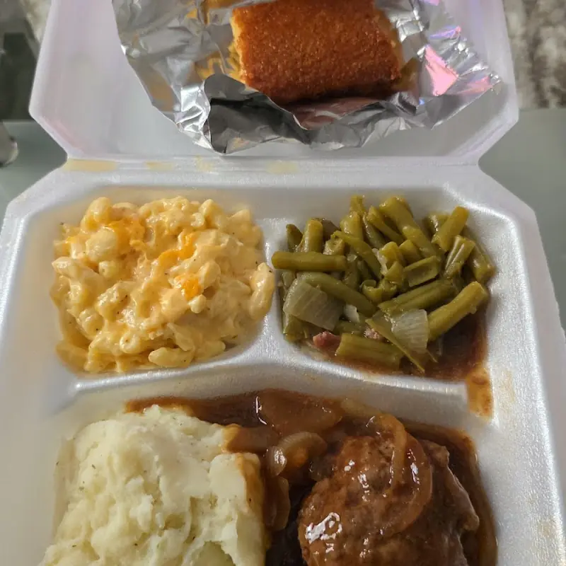 cornbread muffin piped mash, gravy and a chicken tender.