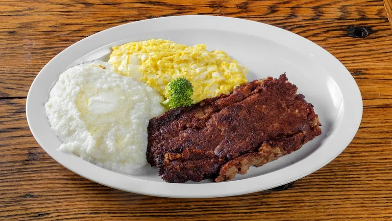 2 Eggs & Corned Beef Hash with Home Fries or Grits