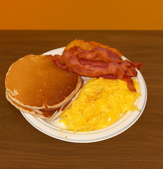 (3)pancakes,hash brown,bacon & eggs plate