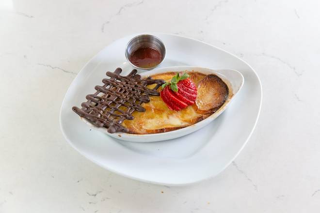HOUSE-MADE WHITE CHOCOLATE BREAD PUDDING