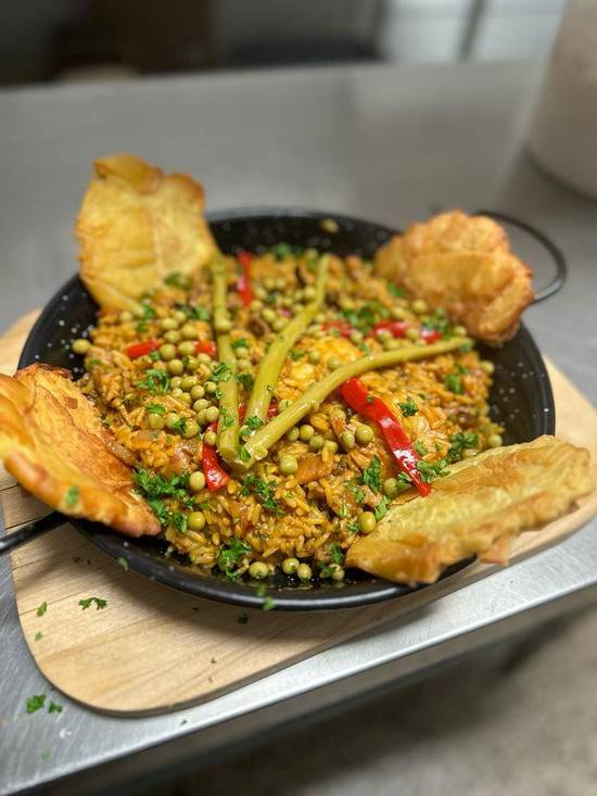Paella de carnes