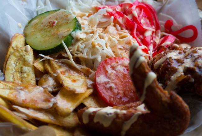 Pollo con tajadas