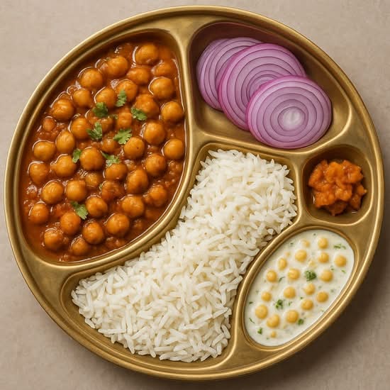 Amritsari Chole, Jeera Rice, Dahi, Onions  with Pickle