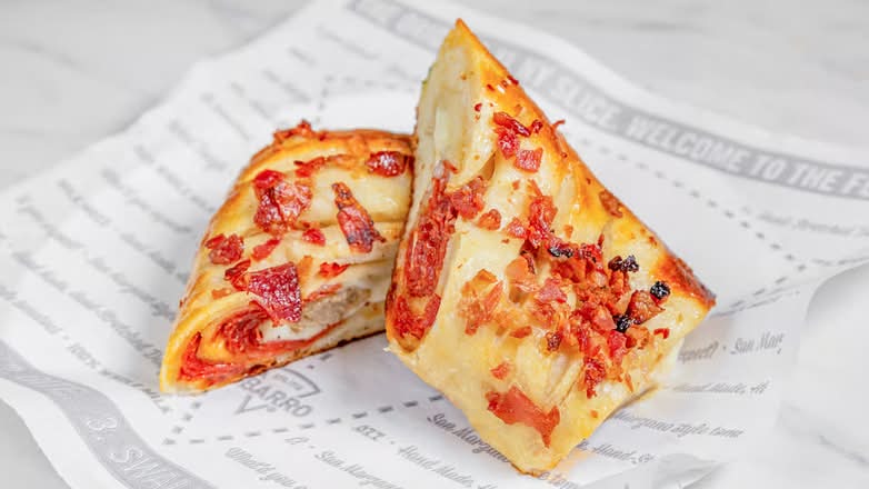 Pepperoni And Sausage With Bacon Bits On Top